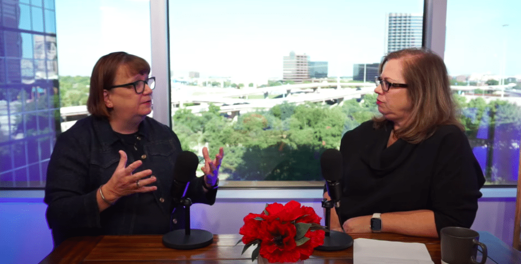Two women recording a podcast in studio