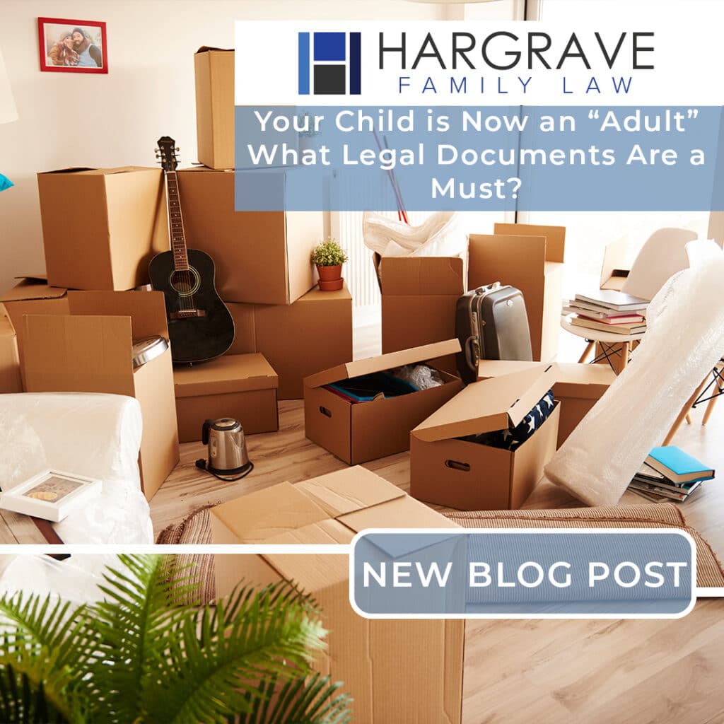 Moving boxes and guitar in packed apartment