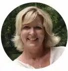 Smiling blonde woman outdoors in circular portrait