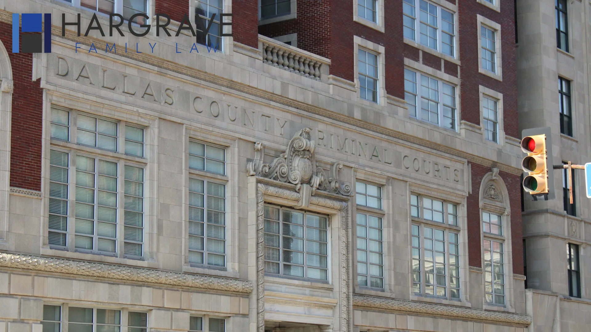 A historic brick Dallas County government building downtown, where child support orders are filed and enforced.