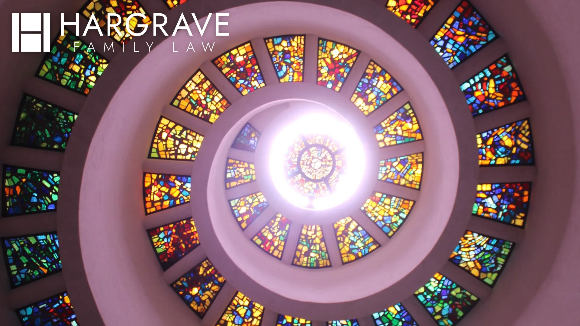 The spiral stained glass dome of the Thanks-Giving Chapel in Dallas, reflecting the cooperative approach of collaborative divorce.