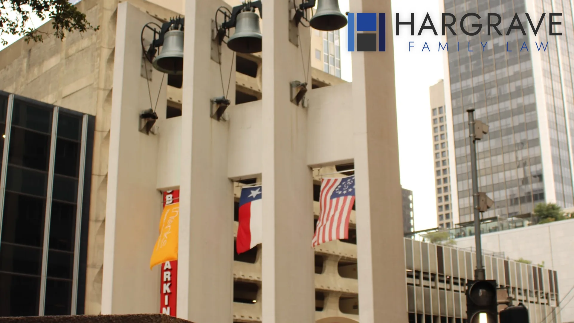 Banners on a downtown Dallas office building facade, in the district where women meet with divorce attorneys.