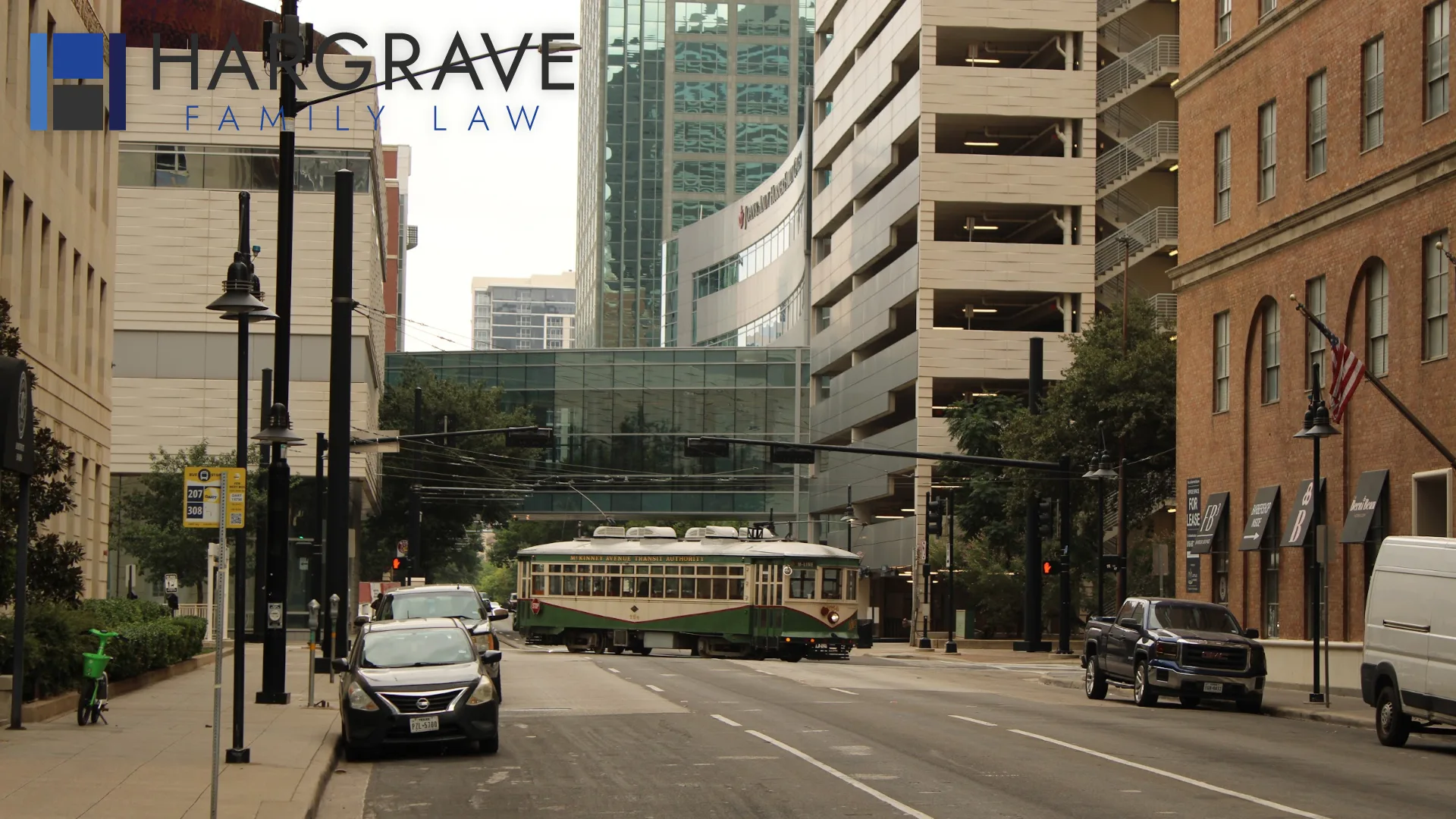 A streetcar passing through downtown Dallas, where LGBTQ+ couples work with local divorce attorneys.