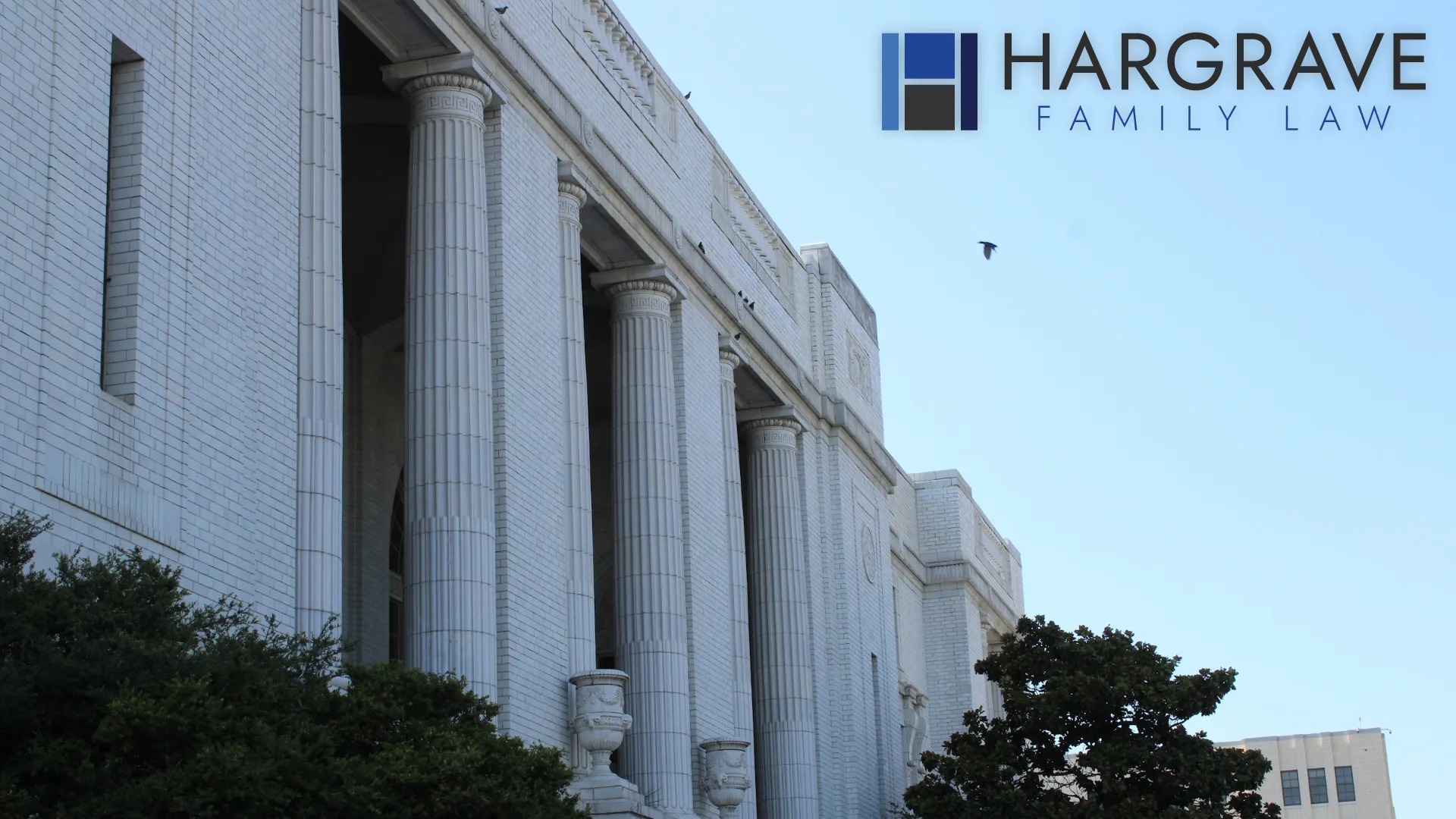 A columned government building in downtown Dallas, where military families handle divorce and pension division.