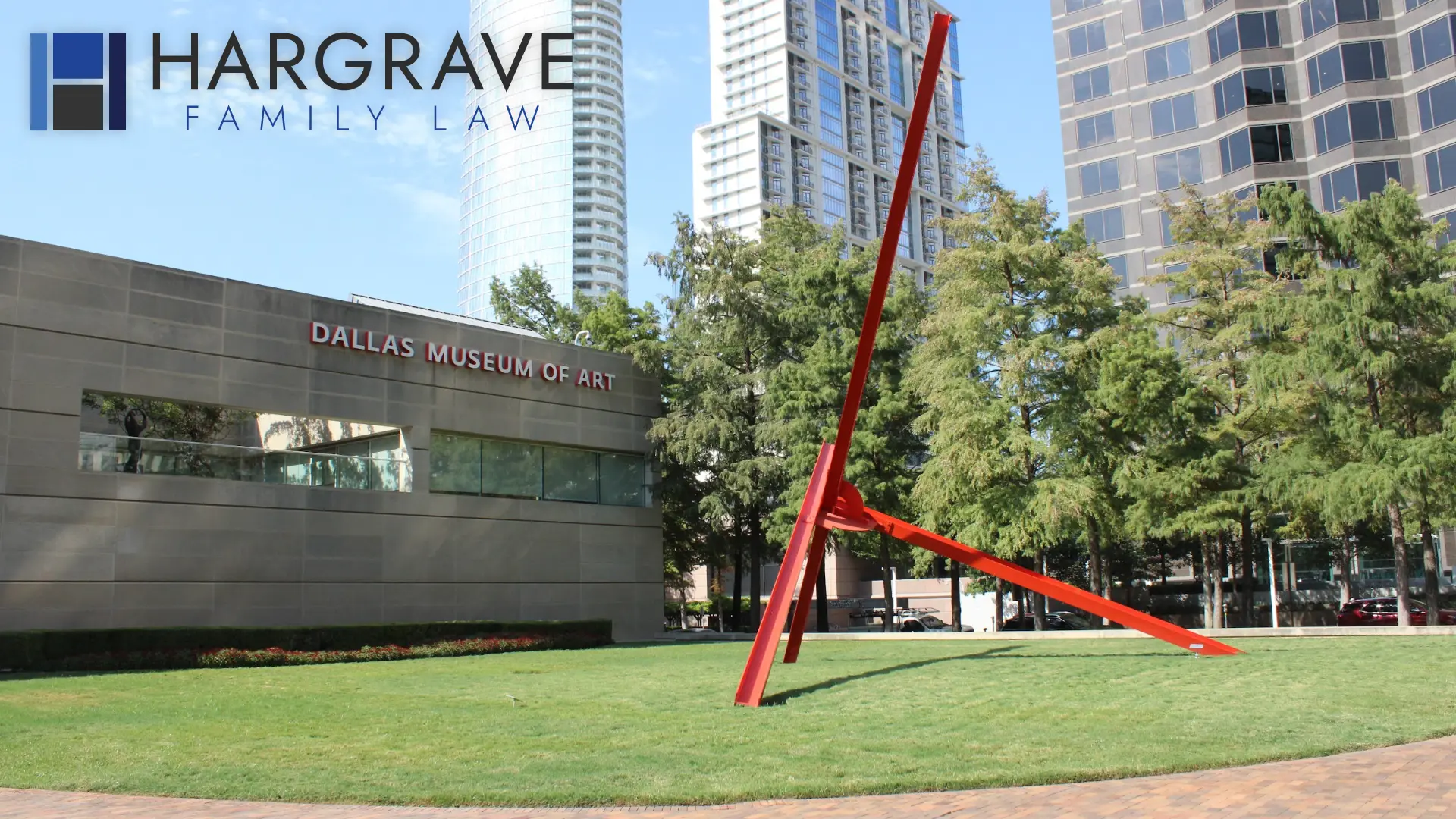 A red steel sculpture in a downtown Dallas plaza, where married couples negotiate postnuptial agreements.